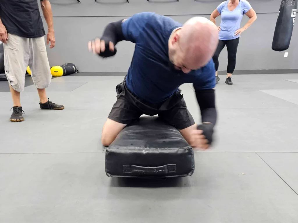 Krav Maga Boxing Workout at Guardian Krav Maga LLC in Maryland, MD A Guy Doing Krav Maga Boxing Workout at Guardian Krav Maga LLC in Maryland, MD